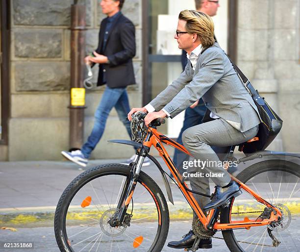 modern man on environment friendly bike, stureplan - stureplan bildbanksfoton och bilder