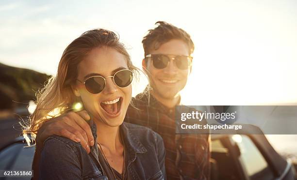 the highlight of our trip - couple in car smiling stock pictures, royalty-free photos & images