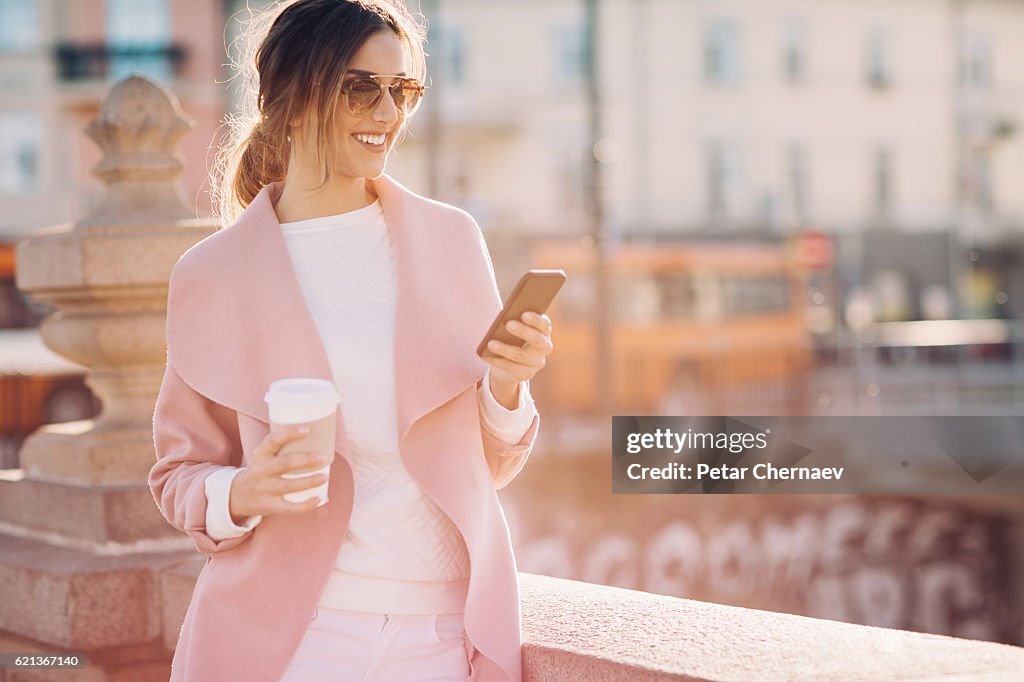 Fashionable woman with smart phone