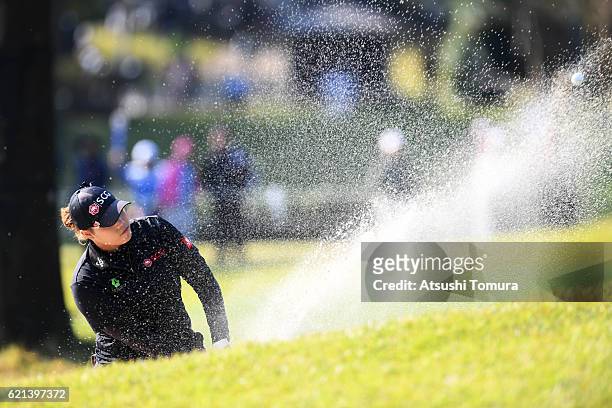 Ariya Jutanugarn of Thailand hits from a bunker on the 13th hole during the final round of the TOTO Japan Classics 2016 at the Taiheiyo Club Minori...