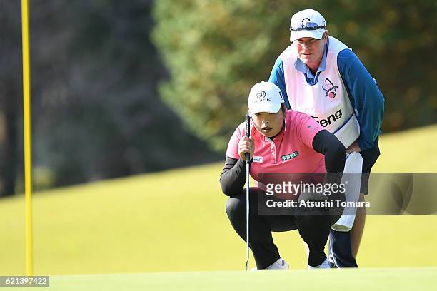 Shanshan Feng of China lines up her putt during the final round of the TOTO Japan Classics 2016 at the Taiheiyo Club Minori Course on November 6,...