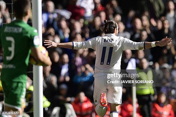 Real Madrid's Welsh forward Gareth Bale celebrates after scoring a goal during the Spanish league football match Real Madrid CF vs Club Deportivo...