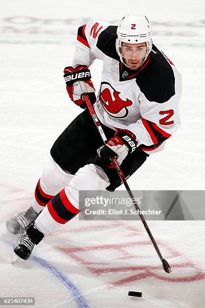 John Moore of the New Jersey Devils skates with the puck against the Florida Panthers at the BB&T Center on November 3, 2016 in Sunrise, Florida.