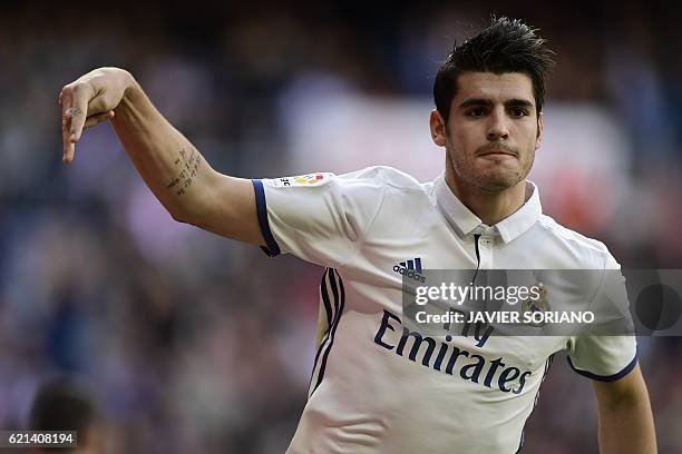 Real Madrid's forward Alvaro Morata celebrates after scoring a goal during the Spanish league football match Real Madrid CF vs Club Deportivo Leganes...