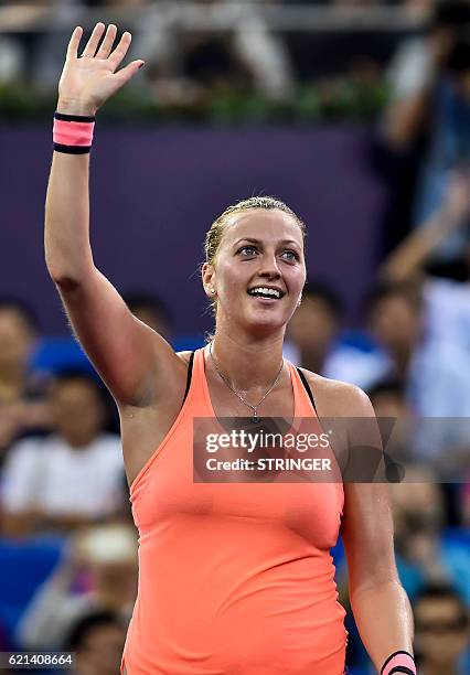 Petra Kvitova of the Czech Republic waves to the audience after winning the singles final match against Elina Svitolina of Ukraine at the WTA Elite...