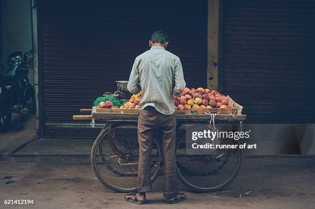 fruit seller - market vendor imagens e fotografias de stock