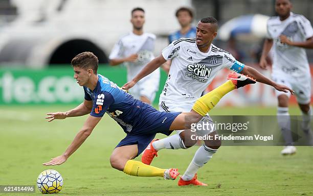 Thiago Maia of Santos fights for the ball with Joao Vitor of Ponte Preta during the match between Ponte Preta and Santos for the Brazilian Series A...