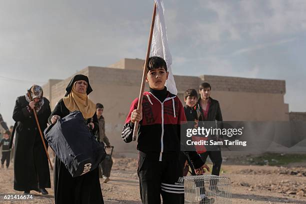 Civilians flee from the Zahara neighbourhood on the north eastern edge of Mosul as fighting continues nearby, on November 6th in Mosul Iraq. Fighting...