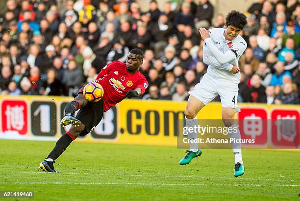 November 06: Paul Pogba of Manchester United scores during the Premier League match between Swansea City and Manchester United at The Liberty Stadium...