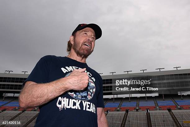 Actor Chuck Norris reacts prior to the NASCAR Sprint Cup Series AAA Texas 500 at Texas Motor Speedway on November 6, 2016 in Fort Worth, Texas.