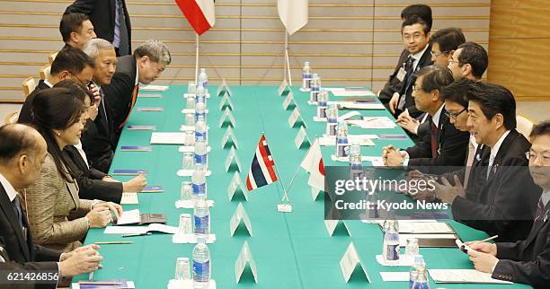 Japan - Japanese Prime Minister Shinzo Abe holds talks with his Thai counterpart Yingluck Shinawatra at his office in Tokyo on May 23, 2013.