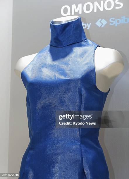 Japan - Photo taken in Tokyo on May 24 shows a dress made by Japanese bioventure Spiber Inc. On a trial basis from artificially produced spider silk....