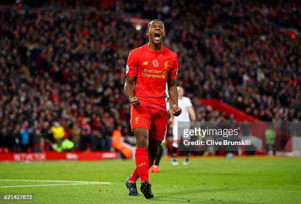 Georginio Wijnaldum of Liverpool celebrates after scoring his sides sixth goal during the Premier League match between Liverpool and Watford at...