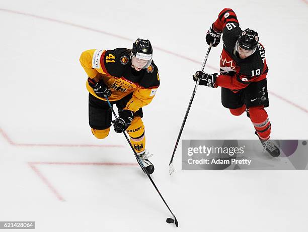 Jonas Mueller of Germany controls the puck during the Germany v Canada Deutschland Cup 2016 Ice Hockey match at Curt Frenzel Stadion on November 6,...