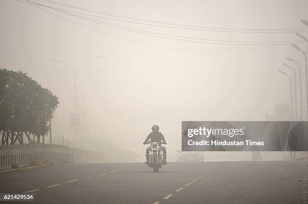 Huge layer of smoke covered city after the biggest celebration of Diwali festival, on November 6, 2016 in Noida, India. New Delhi's air quality has...