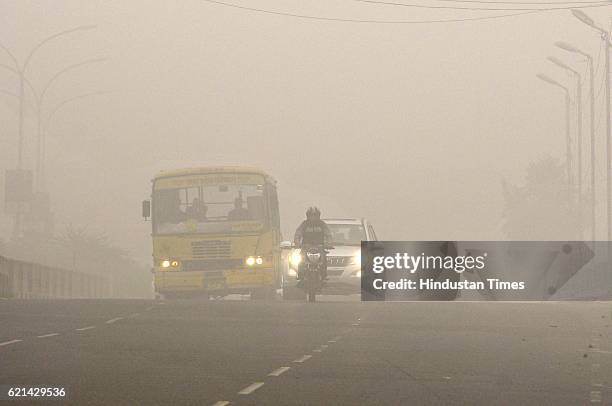 Huge layer of smoke covered city after the biggest celebration of Diwali festival, on November 6, 2016 in Noida, India. New Delhi's air quality has...