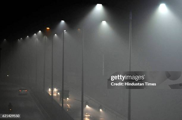 Huge layer of smoke covered city after the biggest celebration of Diwali festival, on November 6, 2016 in Noida, India. New Delhi's air quality has...