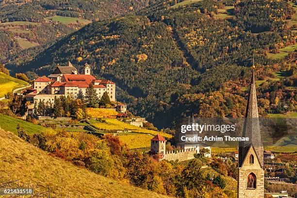 view to säben abbey in autumn, south tyrol, italy - klausen stock pictures, royalty-free photos & images