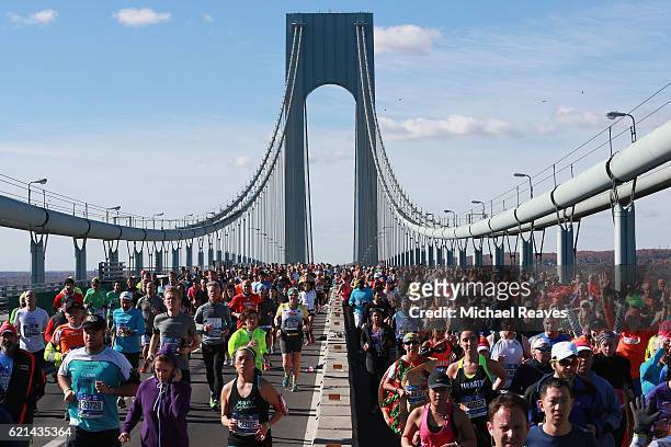 Runners cross the Verrazano-Narrows Bridge at the start of the 2016 TCS New York City Marathon on November 6, 2016 in the Brooklyn borough of New...