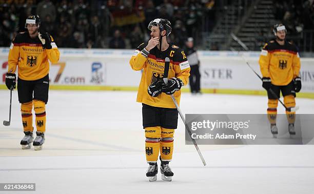 Kai Hospelt of Germany is dejected after losing the Germany v Canada Deutschland Cup 2016 Ice Hockey match at Curt Frenzel Stadion on November 6,...
