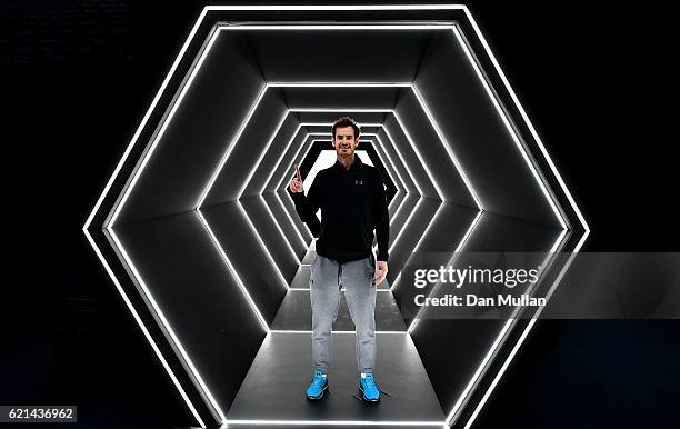 Andy Murray of Great Britain poses after winning the Mens Singles Final against John Isner of the United States on day seven of the BNP Paribas...