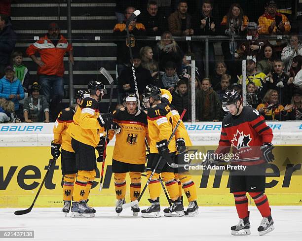 Thomas Greilinger of Germany celebrates scoring a goal during the Germany v Canada Deutschland Cup 2016 Ice Hockey match at Curt Frenzel Stadion on...