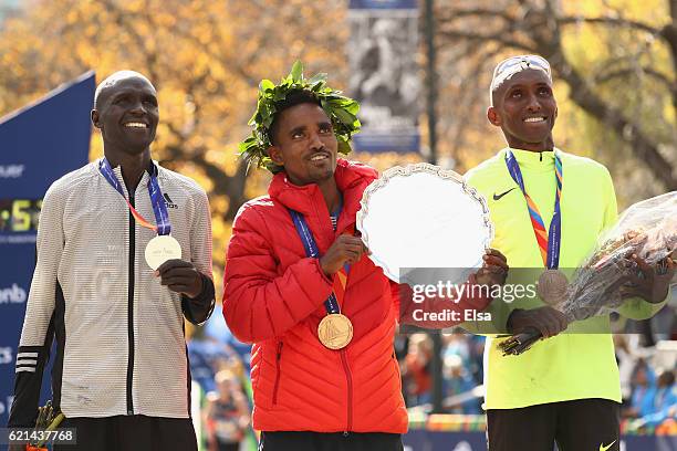 First-place finisher Ghirmay Ghebreslassie of Eritrea, second-place finisher Lucas Rotich of Kenya and third-place finisher Abdi Abdirahman of the...
