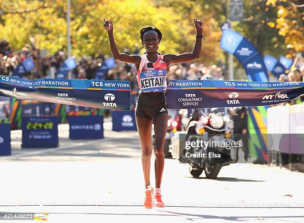 Mary Keitany of Kenya crosses the finish line to finish first in the Professional Women's Division during the 2016 TCS New York City Marathon in...