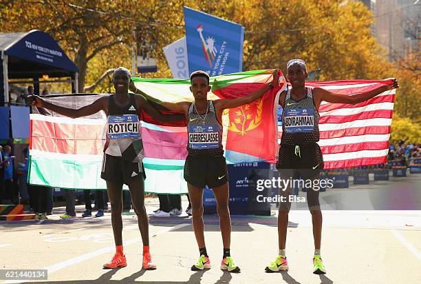 First-place finisher Ghirmay Ghebreslassie of Eritrea, second-place finisher Lucas Rotich of Kenya and third-place finisher Abdi Abdirahman of the...