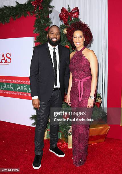 Director David E. Talbert and his Wife Lyn Talbert attend the premiere of "Almost Christmas" at Regency Village Theatre on November 3, 2016 in...