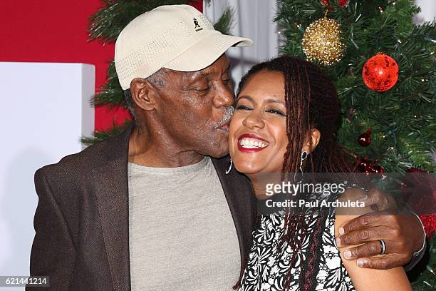 Actor Danny Glover and his Wife Elaine Cavalleiro attend the premiere of "Almost Christmas" at Regency Village Theatre on November 3, 2016 in...