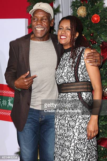 Actor Danny Glover and his Wife Elaine Cavalleiro attend the premiere of "Almost Christmas" at Regency Village Theatre on November 3, 2016 in...