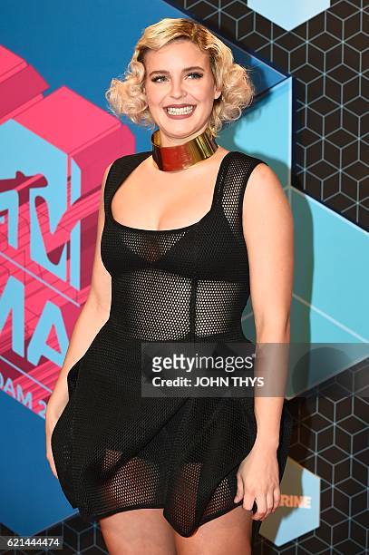 British singer Anne-Marie poses on the red carpet at the MTV Europe Music Awards on November 6, 2016 at the Ahoy Rotterdam in Rotterdam. / AFP / JOHN...