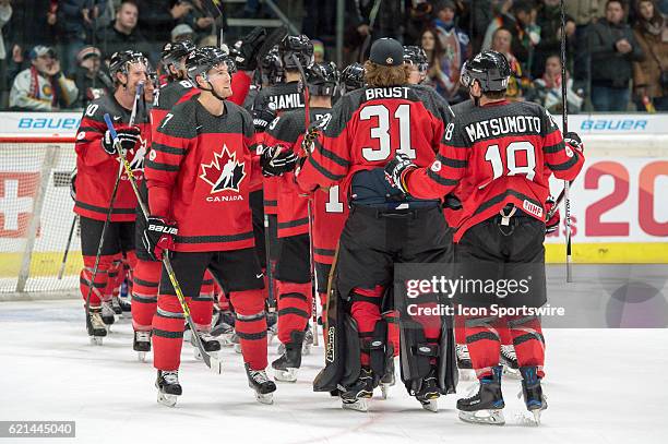Team Canada celebrates after the Deutschland Cup between Germany and Canada on November 06 at Curt Frenzel Stadium in Augsburg, Germany.