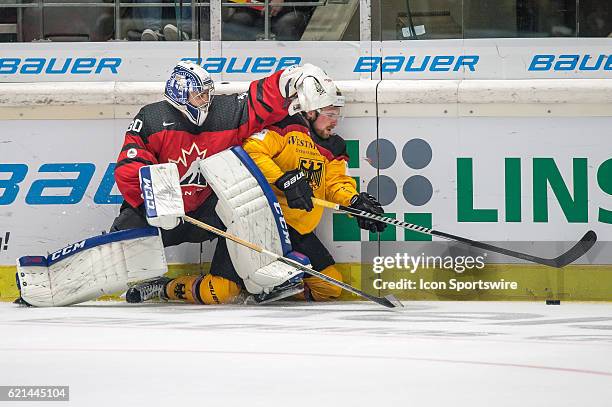 Goalie Danny Taylor vies with Goalie Mathias Niederberger during the Deutschland Cup between Germany and Canada on November 06 at Curt Frenzel...