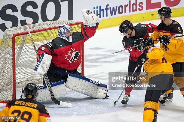 Goalie Danny Taylor makes a glove save during the Deutschland Cup between Germany and Canada on November 06 at Curt Frenzel Stadium in Augsburg,...