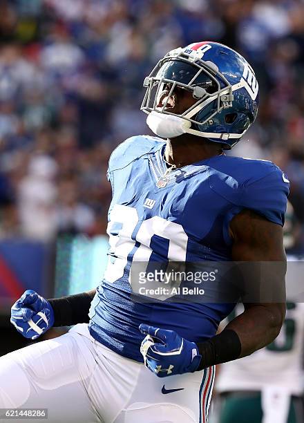 Jason Pierre-Paul of the New York Giants reacts after a play against the Philadelphia Eagles during the first half of the game at MetLife Stadium on...