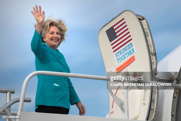 Democratic presidential nominee Hillary Clinton boards her plane at Philadelphia International Airport November 6, 2016 in Philadelphia,...