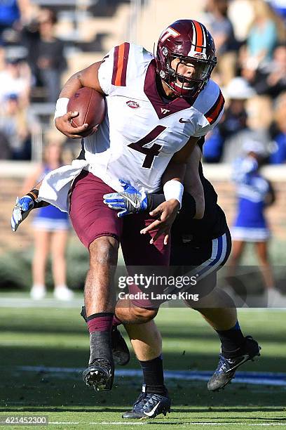 Jerod Evans of the Virginia Tech Hokies runs with the ball against the Duke Blue Devils at Wallace Wade Stadium on November 5, 2016 in Durham, North...