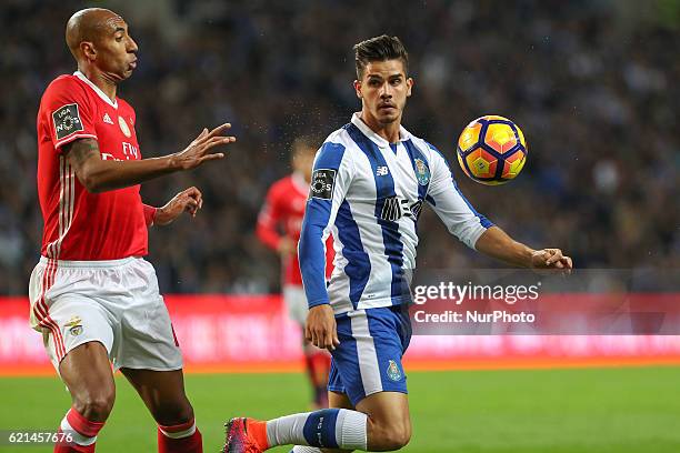 Porto's Portuguese forward Andre Silva in action with Benfica's Brazilian defender Luisao during the Premier League 2016/17 match between FC Porto...