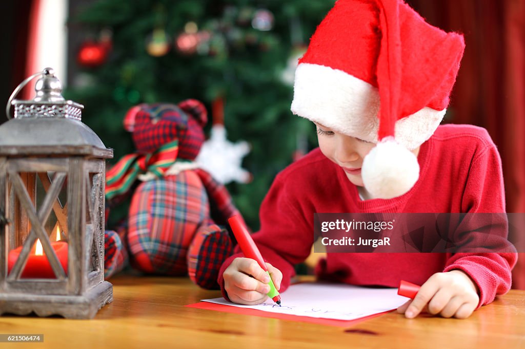 Child Writing a Christmas Letter to Santa Claus