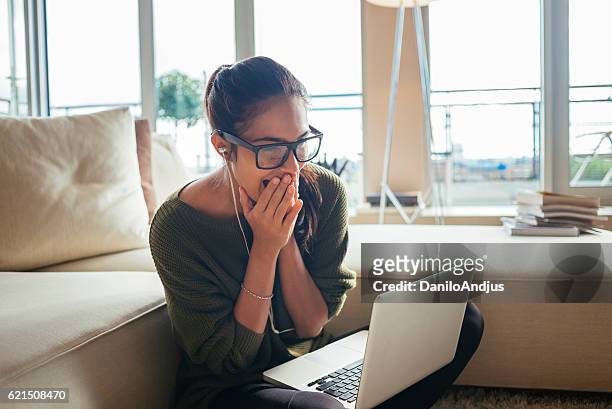 exited and cheerfull woman using her laptop - excitement stock pictures, royalty-free photos & images