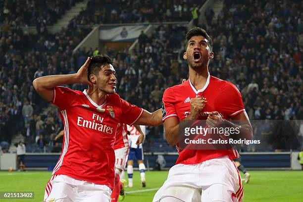 Benfica's defender Lisandro Lopez from Argentina celebrates scores Benfica«s goal with Benfica's forward Raul Jimenez from Mexico during the FC Porto...