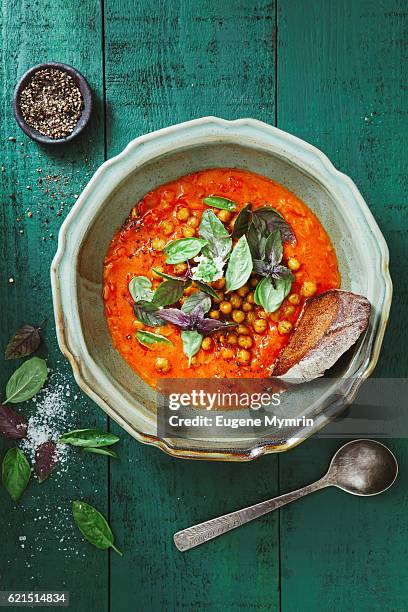 harissa soup with potato and chickpeas - rustic plate overhead stock-fotos und bilder