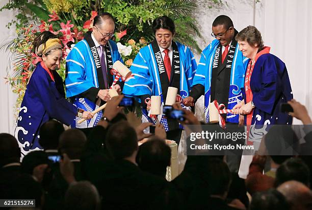 Japan - Japanese singer Misia, World Bank chief Jim Yong Kim, Japanese Prime Minister Shinzo Abe, Ethiopian Prime Minister Hailemariam Desalegn and...