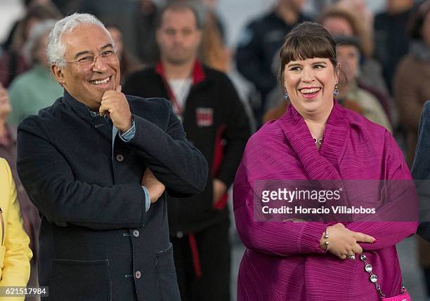 Portuguese artist Joana Vasconcelos is accompanied by Portugal's Prime Minister Antonio Costa during the inauguration of Pop Galo, her public art...