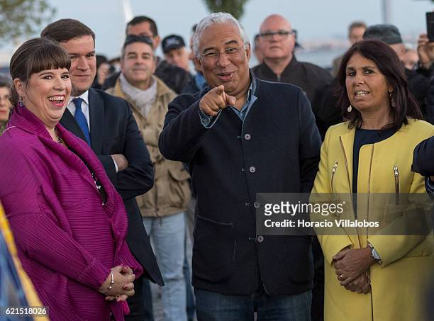 Portuguese artist Joana Vasconcelos is accompanied by Portugal's Prime Minister Antonio Costa and his wife Fernanda Maria Goncalves Tadeu , during...