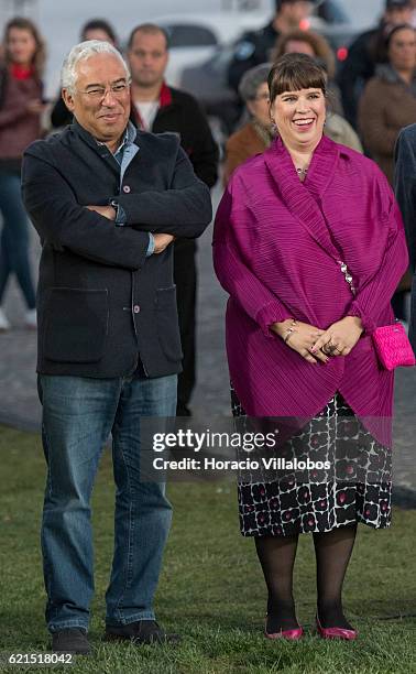 Portuguese artist Joana Vasconcelos is accompanied by Portugal's Prime Minister Antonio Costa during the inauguration of Pop Galo, her public art...