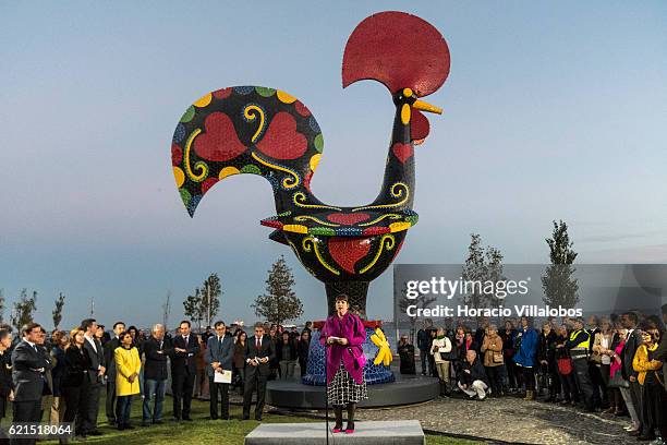 Portuguese artist Joana Vasconcelos is accompanied by Portugal's Prime Minister Antonio Costa during the inauguration of Pop Galo, her public art...