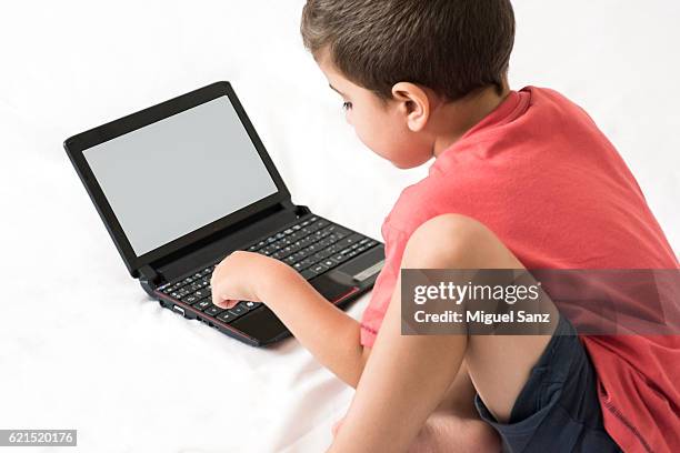 Kid Using Labtop With Mouse 165 Mouse Bed Stock Photos, High-Res Pictures, and Images - Getty Images